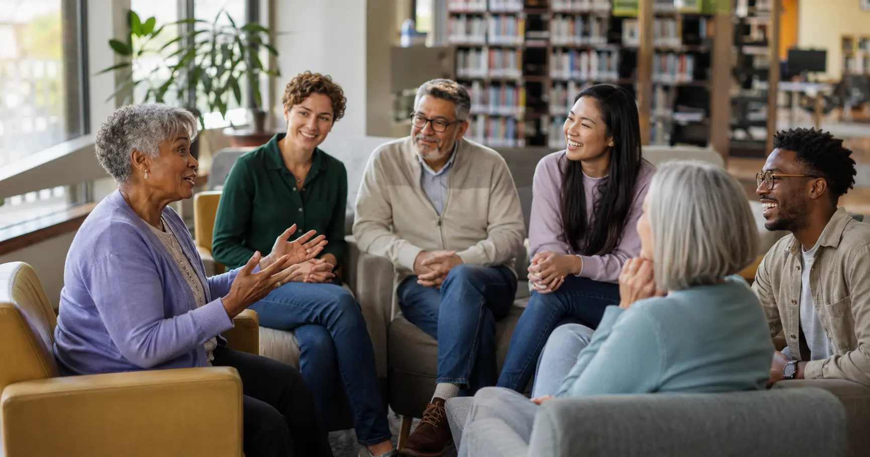 Librarians of different ages sharing stories in a relaxed circle