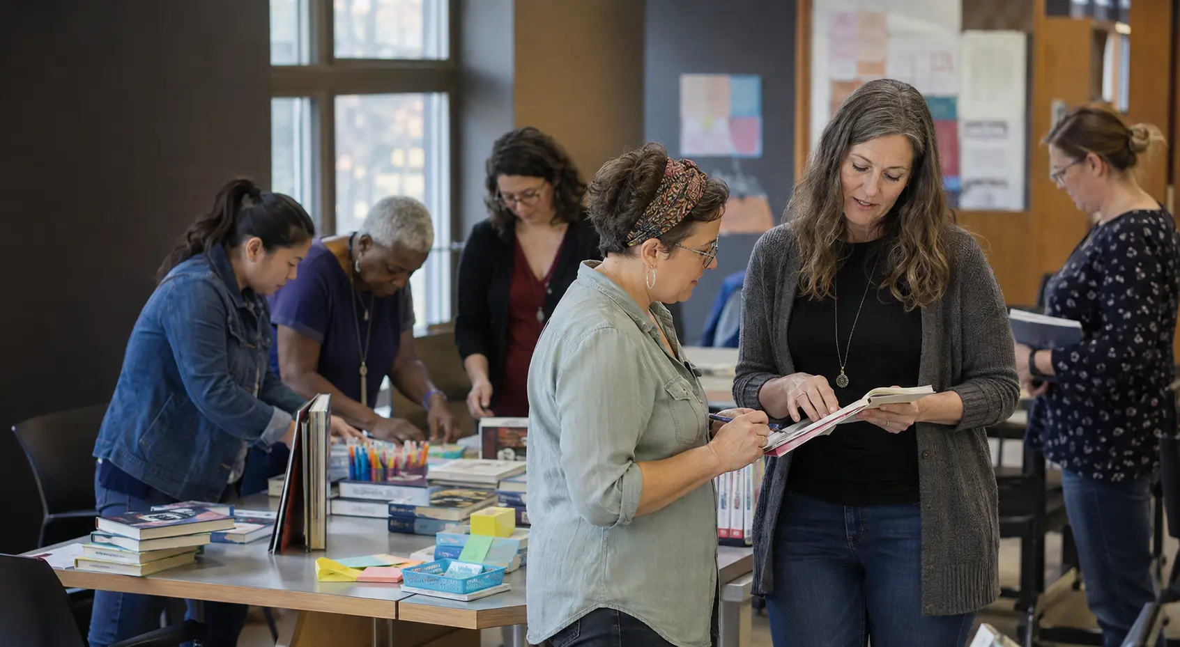 Librarians collaborating during a hands-on workshop